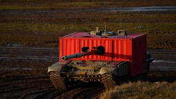Tanks Covered with Shipping Containers: A New Solution Against Drones