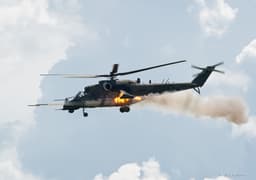 Strikes Tanks and IFVs from the Air with Missiles: Spectacular Footage of the Combat Operation of the Mi-35M "Super Crocodile" Helicopter