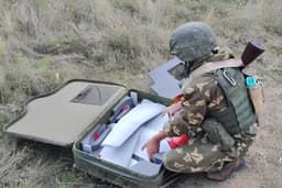 Russian Unmanned "Flying Wing" Made of Plywood and Foam Armed with Missiles