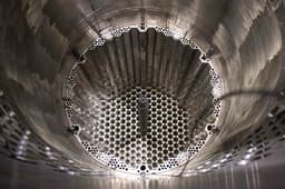 Start of commissioning works: Dummy fuel assemblies are being loaded into the reactor at the Rooppur NPP in Bangladesh