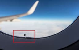 One of the Most Mysterious Aviation Secrets Revealed: What are Those Tiny Holes in Airplane Windows For?