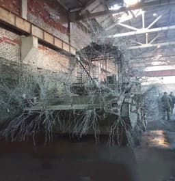 Антидроновый ёжик: кадры самой необычной БМП-2 у российских военных