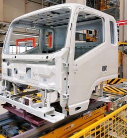 «Мокрым по мокрому»: «КАМАЗ» обновил технологию окраски кабин грузовиков серии «Компас» 