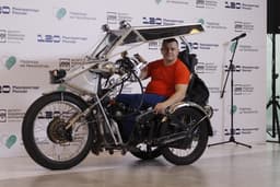 "It took 10 years to develop": Russian man invents hand-controlled motorbike after losing the ability to walk