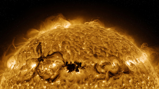 Growth of active regions on the Sun stopped: flare power decreased to class C