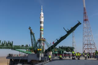 How the Soyuz rocket with a manned spacecraft is transported to the launch pad at Baikonur