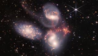 Incident at the Galactic Crossroads: Shockwave from Galaxy Collision in Stephan's Quintet Reaches Earth