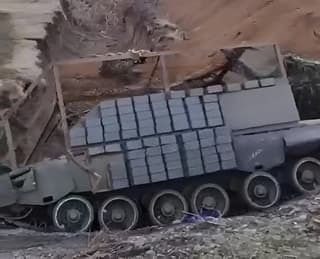 Russian Military Turns T-80BV Tank into a Homemade Heavy APC: Unique Footage