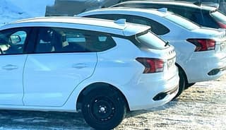 Lada Iskra Prepares for Market Launch: Sedan and Wagon Pose in a Group Photo