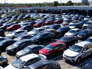 Parking at the former Volkswagen plant is filled with new cars
