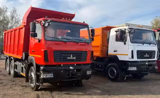 MAZ-5550S5 and MAZ-650128 dump trucks for transporting bulk cargo presented in the Mogilev region