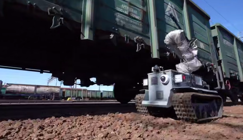 Domestic robot for automatic release and checking of freight wagon brakes