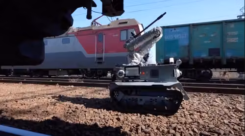 Domestic robot for automatic release and checking of freight wagon brakes