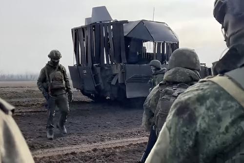 BMP-2M with rubber "barbecue grill"