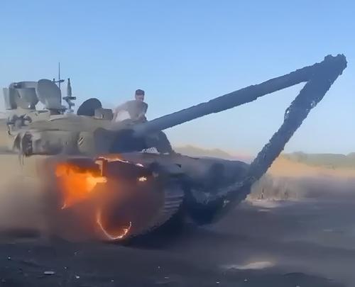 Tanque T-90M con una oruga en llamas