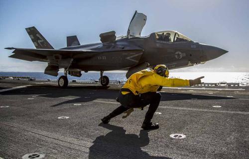 The F-35C fighter, an advanced long-range fifth-generation strike fighter, on the deck of an American aircraft carrier