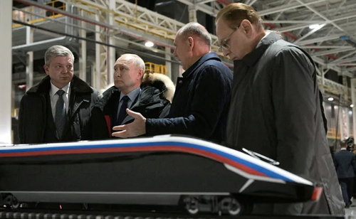 Putin is shown a model of a train for the HSR