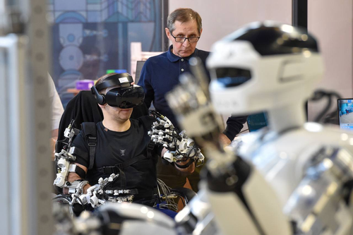 Cosmonaut Ivan Wagner controls the anthropomorphic robot Marfa