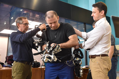 Cosmonaut Ivan Wagner controls the anthropomorphic robot Marfa