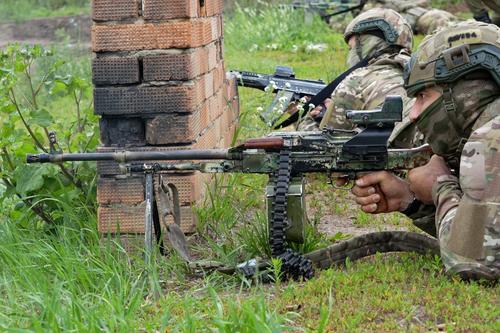 Military personnel fire at UAVs