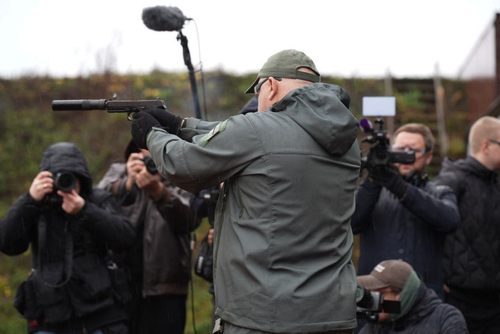 performing an exercise with a Lebedev pistol