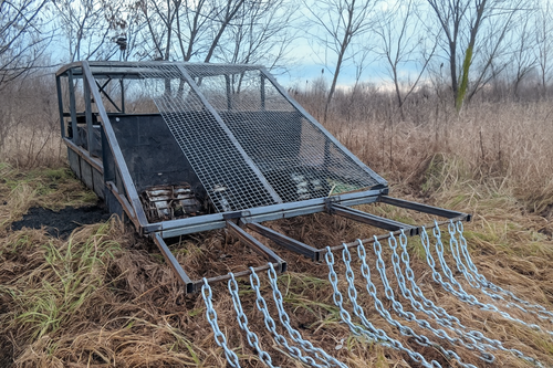 HRTC "Courier" equipped with a protective grid and a mine trawl
