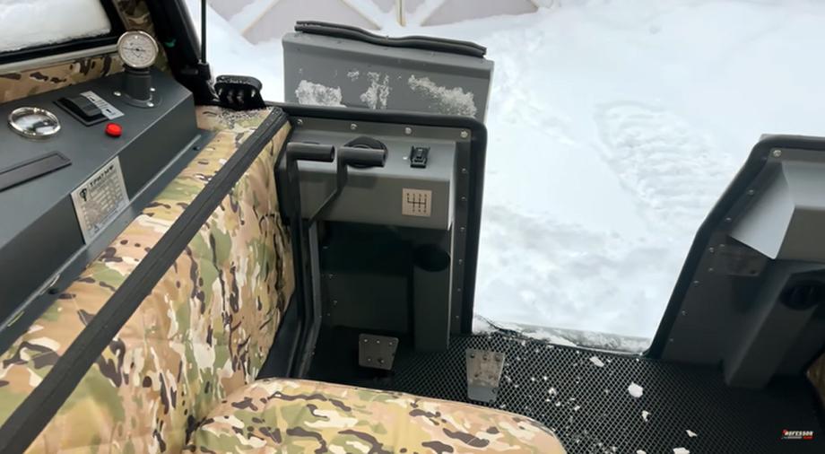 Instead of a steering wheel, the all-terrain vehicle has levers that direct the all-terrain vehicle left and right, if you release both levers at the same time, the brakes will work. The view from the driver's seat will be something like this<br>