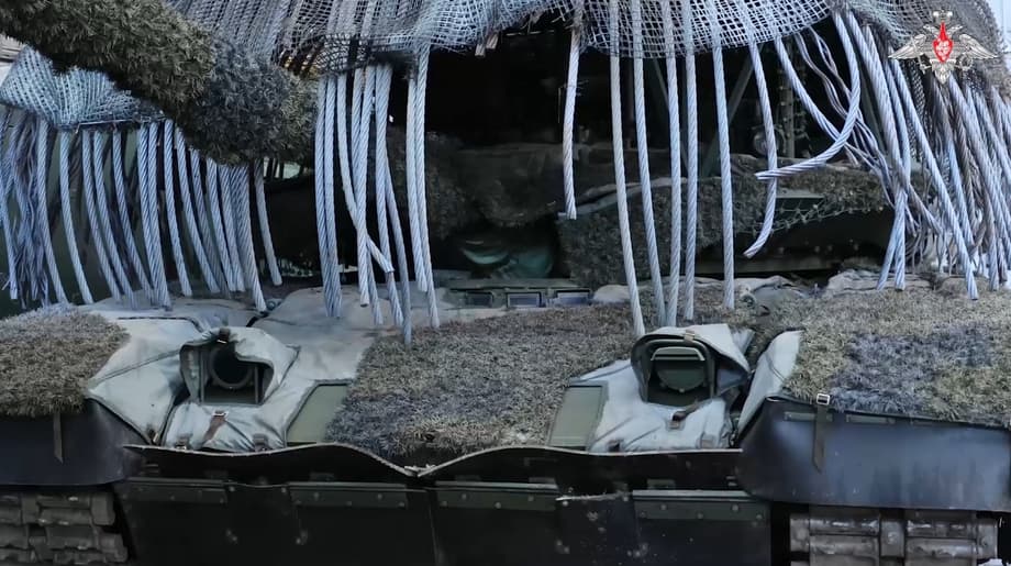 Russian tank with cable turret protection 