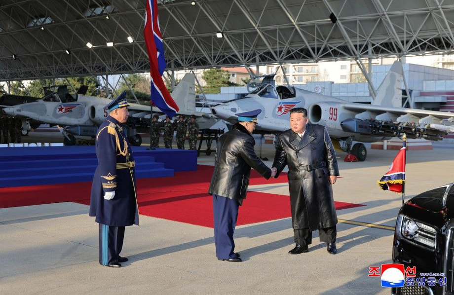 Su-25 attack aircraft in the background