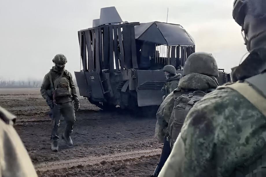 BMP-2M with rubber "barbecue grill"