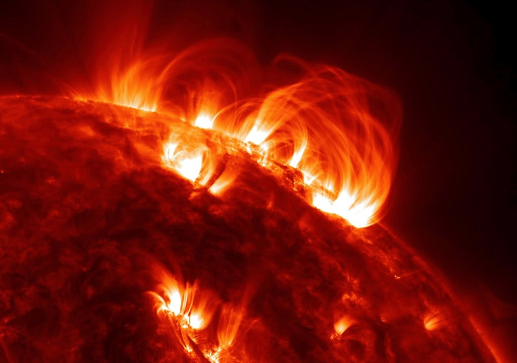 a formation of hot gases that rises above the surface of the Sun