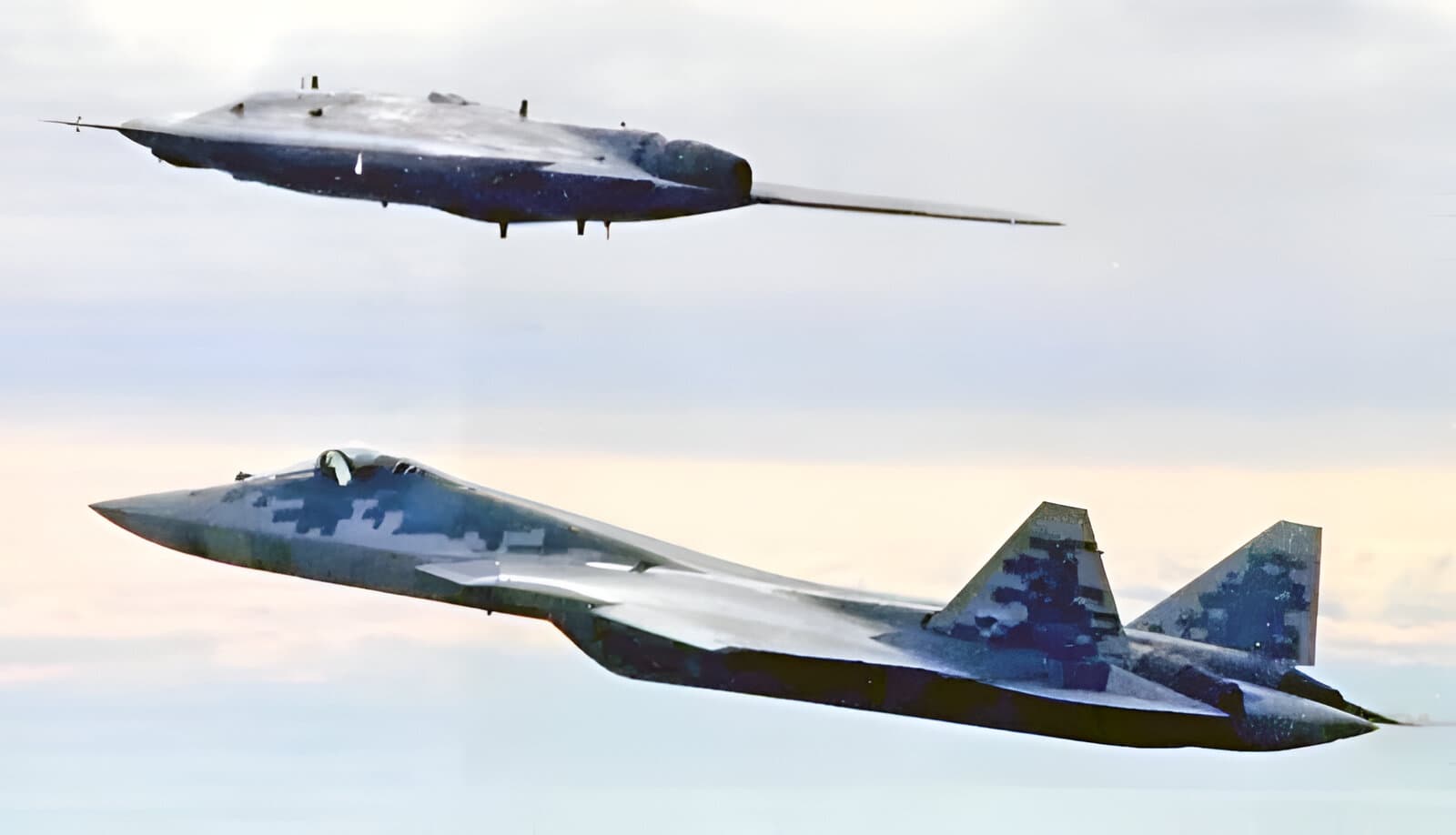 Su-57 in conjunction with the S-70 "Okhotnik" UAV